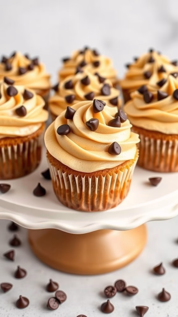 Delicious chocolate chip cookie dough cupcakes topped with creamy frosting and chocolate chips