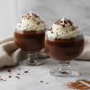 Easy chocolate mousse recipe in glass cups with whipped cream and chocolate shavings